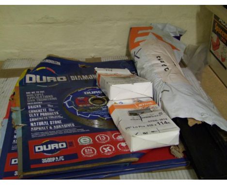 A mixed collection of items to include: diamond blade cutters, Stihl chainsaw blades, lawnmower blades etc. 