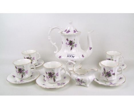 A Hammersley, near complete, Victorian Violets coffee set: 12 pieces including coffee pot, 5 coffee cups, 5 saucers and milk/