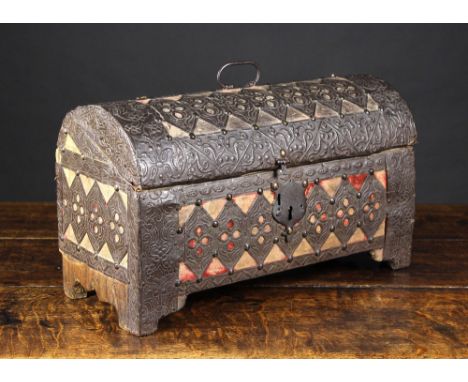 A 16th Century Italian Dome-topped Casket of rectangular form, clad in decorative pierced iron straps with embossed and punch