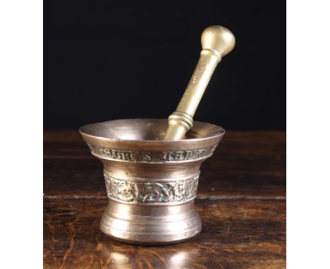 A Fine 16th Century Bellmetal Pestle & Mortar by Peeter Van den Ghein, Malines, dated 1558. The flared rim having a border ba