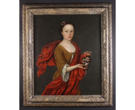 English Provincial School, Circa 1690. A Portrait of a young girl wearing a brown dress with red sash holding a garland of fl