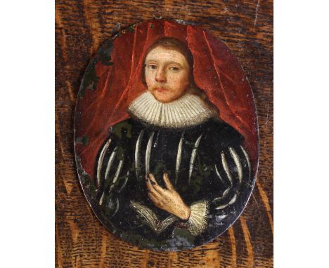 A 16th Century Oil on Oval Copper Panel: Three-quarter length portrait of a Gentleman with ruff and slashed doublet 11½ ins x