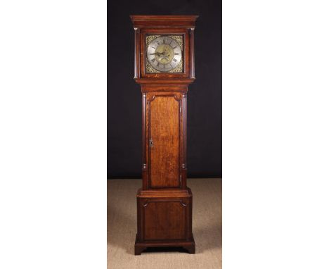 An 18th Century Oak & Mahogany Cross-banded Eight Day Longcase Clock by William Barnish. The 12 inch (30.5 cm) square brass d