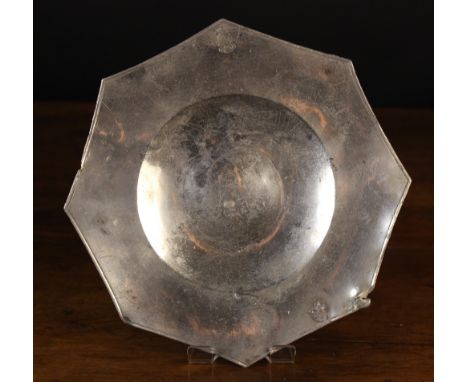 A 16th Century Pewter Eight-Pointed Plate with bossed base, bearing the mark of Sir Thomas Curtis of London, form the Punta C