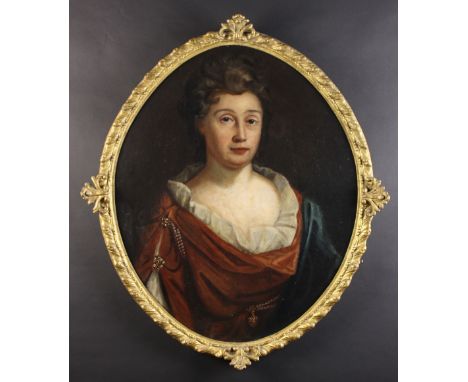 An 18th Century Oval Oil on Canvas: Head & Shoulders Portrait of a Lady (believed to be a member of the Downes Family) 29¼ in