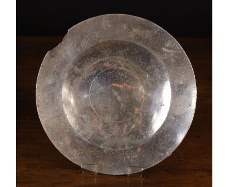 A 16th Century Pewter Bossed Base Plate bearing the mark of Sir Thomas Curtis of London, from the Punta Cana Pewter Wreck, Ci