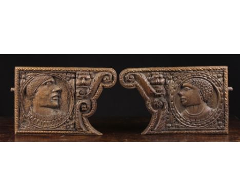 A Pair of 16th Century Oak Flanking Panels carved with portrait roundels and having shaped sides incorporating lion masks and