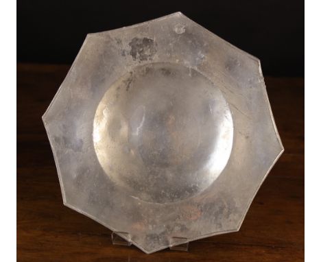 A 16th Century Pewter Eight-Pointed Plate with bossed base, bearing the mark of Sir Thomas Curtis of London, form the Punta C