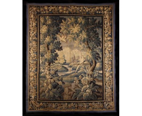 A 17th Century Verdure Tapestry depicting landscape with flowering shrubs in foreground, birds in tall leafy trees either sid