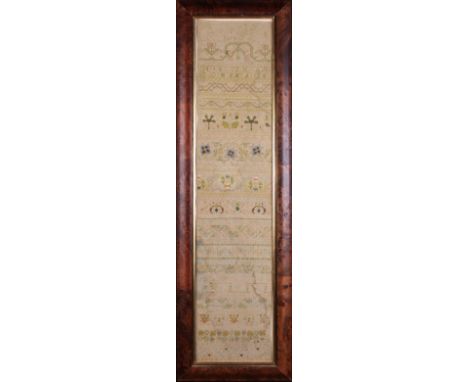 A 17th Century Band Sampler with the date 1670 stitched between a lion and unicorn and the initials EW. With foliate motifs a
