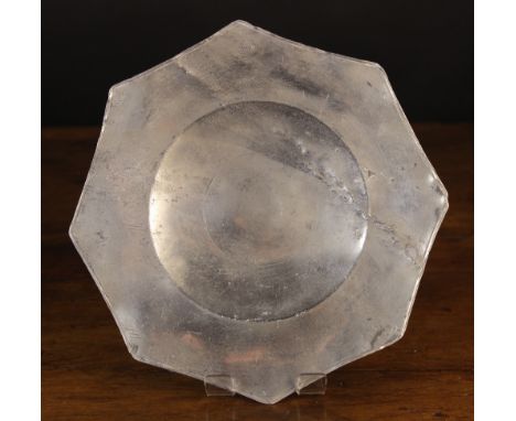 A 16th Century Pewter Eight-Pointed Plate with bossed base, bearing the mark of Sir Thomas Curtis of London, form the Punta C