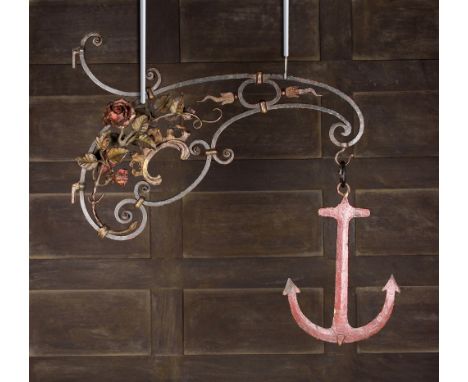 A Fine 19th Century Wrought Iron Wall Bracket with Anchor Pendant.  The anchor painted Ox-blood red and hanging from a scroll
