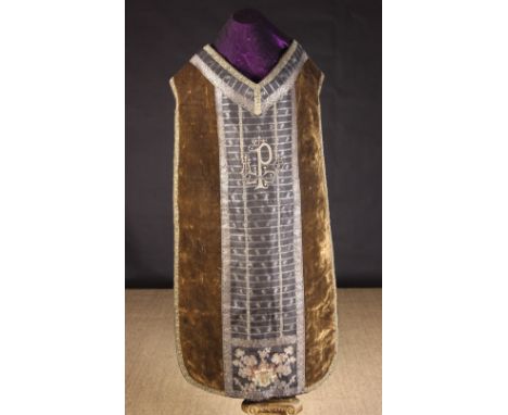 A Fine Brown Velvet Chasuble edged in silver metallic lace and centred with panels of black & silver embroidered brocade with