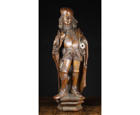 A Fine 16th Century Carved Oak Sculpture of Saint Adrian, attributed to the Lübeck Region of Germany, Circa 1520. The figure 