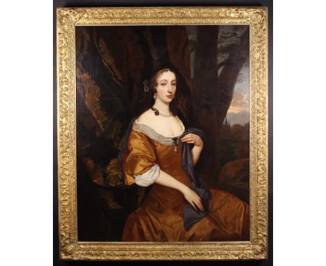 Circle of Sir Peter Lely. Oil on Canvas: Impressive three quarter length Portrait of an Aristocratic Lady wearing a brown dre