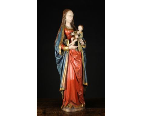 A Beautiful Late Medieval Polychromed Wood Carving of Madonna & Child, Brussels, 15th Century. The Virgin depicted with long 