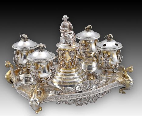 Measurements: 29x22x21 cms. Weight 3.2 kg, in fine silver. Writing desk with a silver tray in its color and gilded finish tha