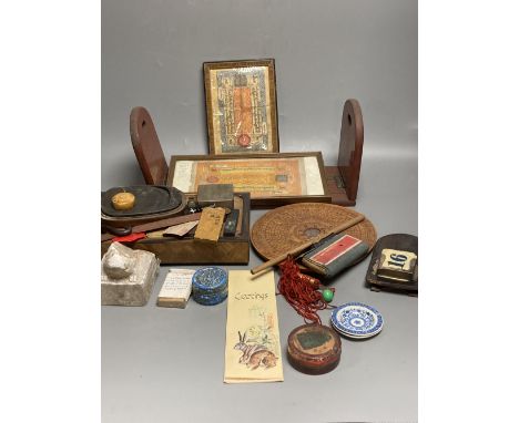 A group of Chinese and Japanese objects, 19th/20th century, including an inscribed ink box an inkstone, a lacquer bookslide, 