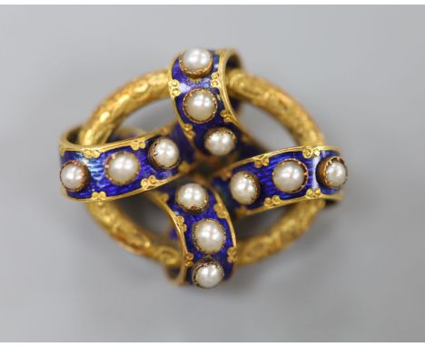 A Victorian yellow metal, blue enamel and split pearl set interwoven oval brooch, 35mm, gross 14 grams.CONDITION: Some minor 