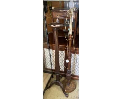 A George III style mahogany torchere, height 140cm and a mahogany lamp standard