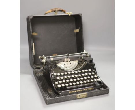 An early 20th century Underwood Elliott Fisher Ltd portable cased typewriter