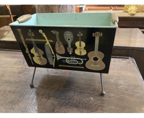 A Worcester ware printed tin two division paper rack, c.1970, width 42cm, depth 24cm, height 33cm
