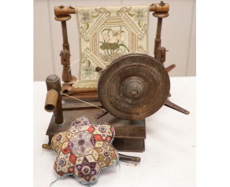 A Victorian bead and patchwork star-shaped pin cushion by 'M E Ashmore 1884' and two other items, a silk embroidery panel, wo