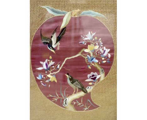 A Japanese silkwork panel of birds on a purple ground, width 48cm to the mounts height 57cm