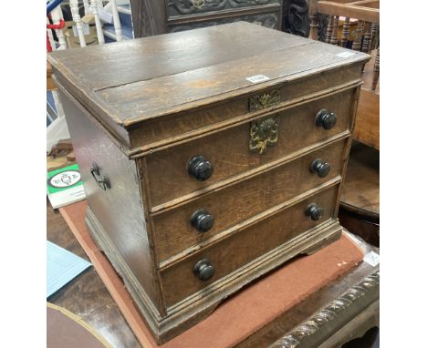 A Queen Anne oak commode, with dummy drawer front, width 46cm, depth 39cm, height 43cm