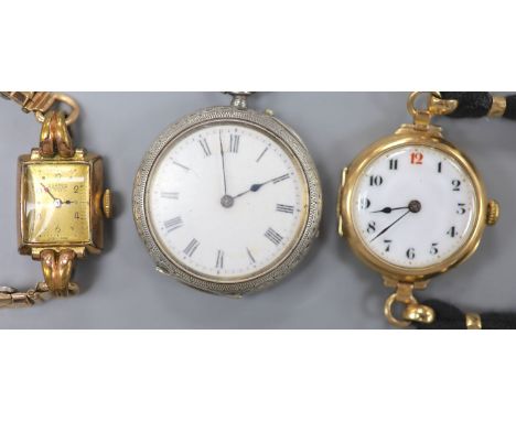 An early 20th century 9ct gold manual wind wrist watch, gross 23.9 grams, one other watch and a silver fob watch.