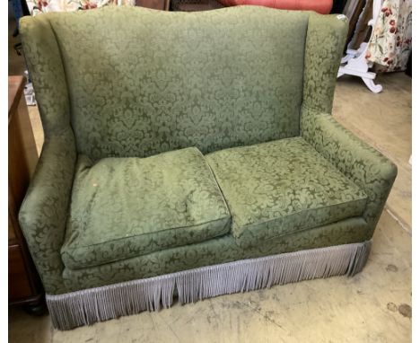 A green damask two seater sofa, width 135cm, depth 70cm, height 100cmCONDITION: Quite comfortable, soft cushions and hard sol