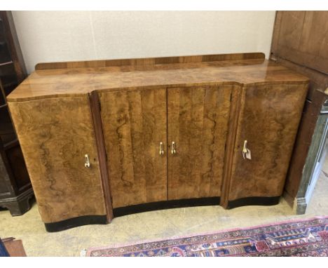 An Art Deco figured walnut sideboard, width 168cm depth 58cm height 98cm