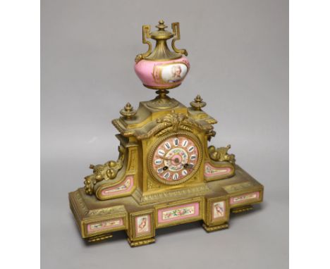 A 19th century French gilt metal and porcelain inset mantel clock, height 37cm