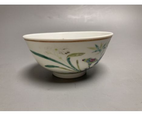 A Chinese famille rose porcelain bowl, Guangxu mark and period, 13cm diameter, 6cm highCONDITION: The bowl has wear on the co