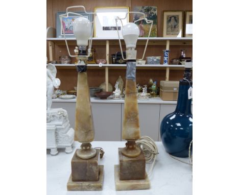 A pair of alabaster table lamp bases, height 45cm excl. electrical fittings