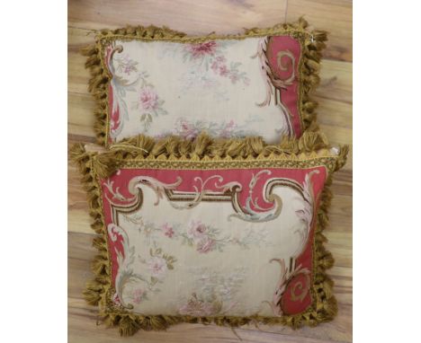 A pair of Aubusson cushions (made from a 19th century Aubusson tapestry)CONDITION: Approx, 42 x 32cmBoth have the same patter