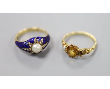 A late Victorian yellow metal, split pearl, rose cut diamond and blue enamel set ring, size J/K, gross 4 grams. and a similar