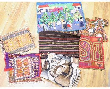 A collection of miscellaneous textiles, comprising a Victorian tapestry wall panel worked with doves, nests and floral scroll