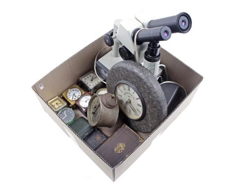 Box with old travel alarm clocks, wall clock &amp; nbsp; and Russian &amp; nbsp; microscope