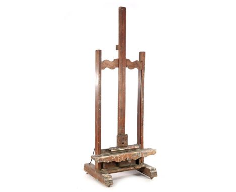 Old oak easel, from the studio of Marius van Beek (1921-2003), mechanism needs to be checked, 218 cm high