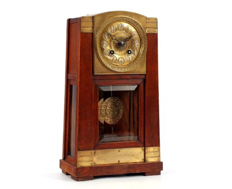 Table clock in oak case with faceted diamonds, brass dial, Amsterdam School ca.1920, 35 cm high