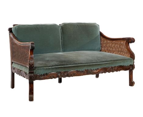 English dark stained oak 2-seater sofa with various stitching, webbing and green-blue cushions, 164 cm wide and 82 cm deep
