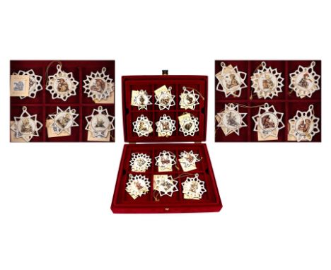 Goebel Hummel 24 porcelain Christmas stars - Weihnachtsschmuck in red case, 34.5 cm wide