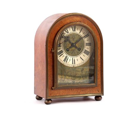 Table clock in a burr walnut case and damaged dial with engraving, 27 cm high