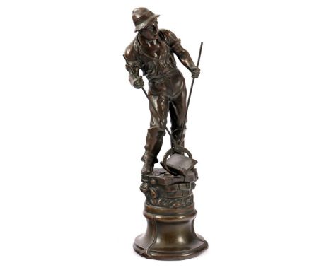 after Egide Rombaux, Worker with piece of railroad tracks, bronze, 52.5 cm high, 5.4 kilograms