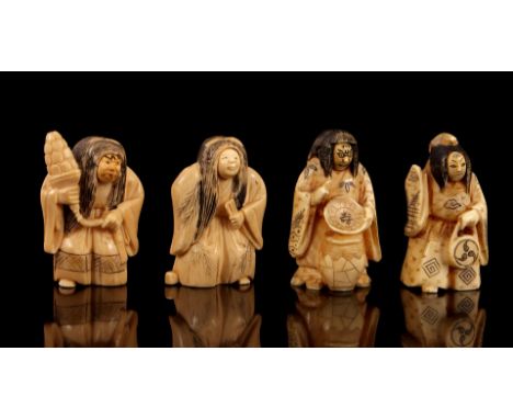 4 Richly carved Netsuke / Okimono of figures with varying faces, Japan, Meiji Period ca.1910, 5 cm high, together 134.6 grams