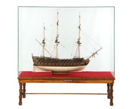 Wooden scale model of a three-master from the 17th century, 93 cm high with accompanying table with glass display case, exter