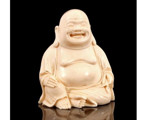 Richly carved ivory statue of an Oriental Buddha, China, ca.1890, 6 cm high, 73.4 grams. With certificate