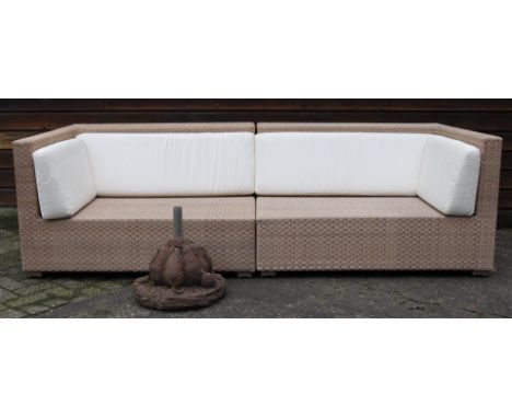Dedon 2-piece lounge set with light loose cushions, dimensions of the 2 parts 120x107 cm and 120x105 cm, with a concrete para