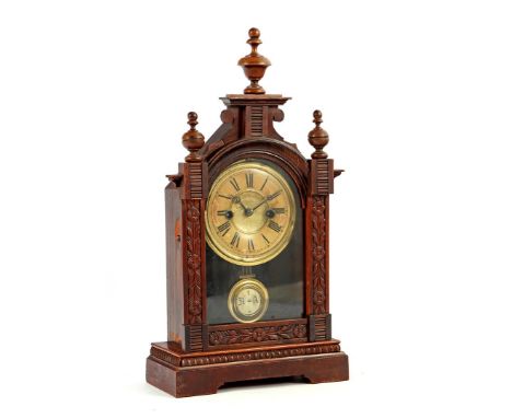Table clock in walnut color decorated case in Gothic style, 44 cm high